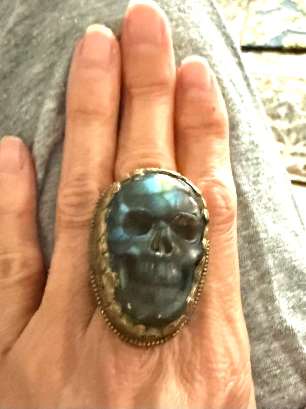 Large carved labradorite skull ring set in brass - adjustable